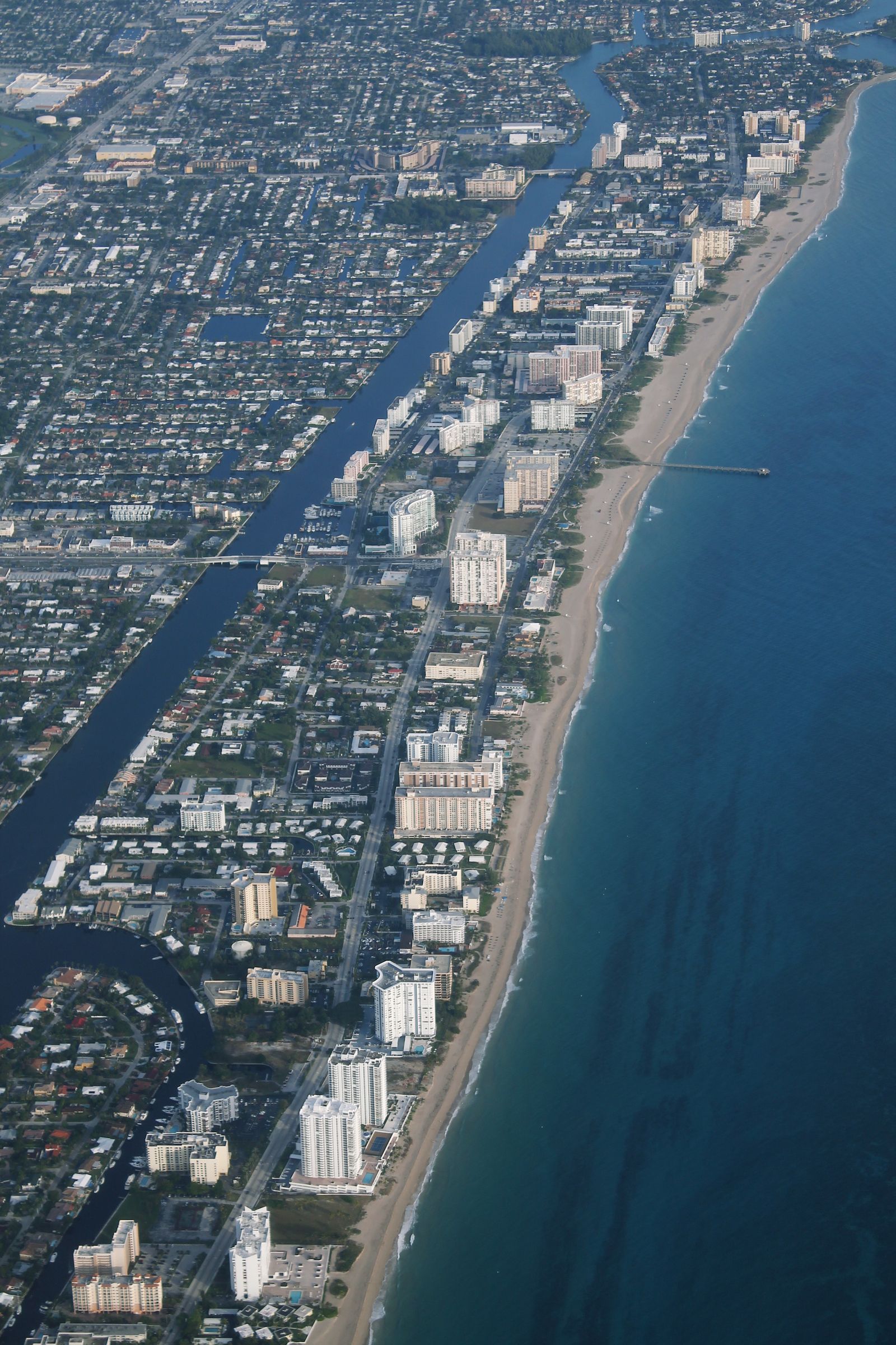 Aerial view of the sandy coastline at Pompano Beach